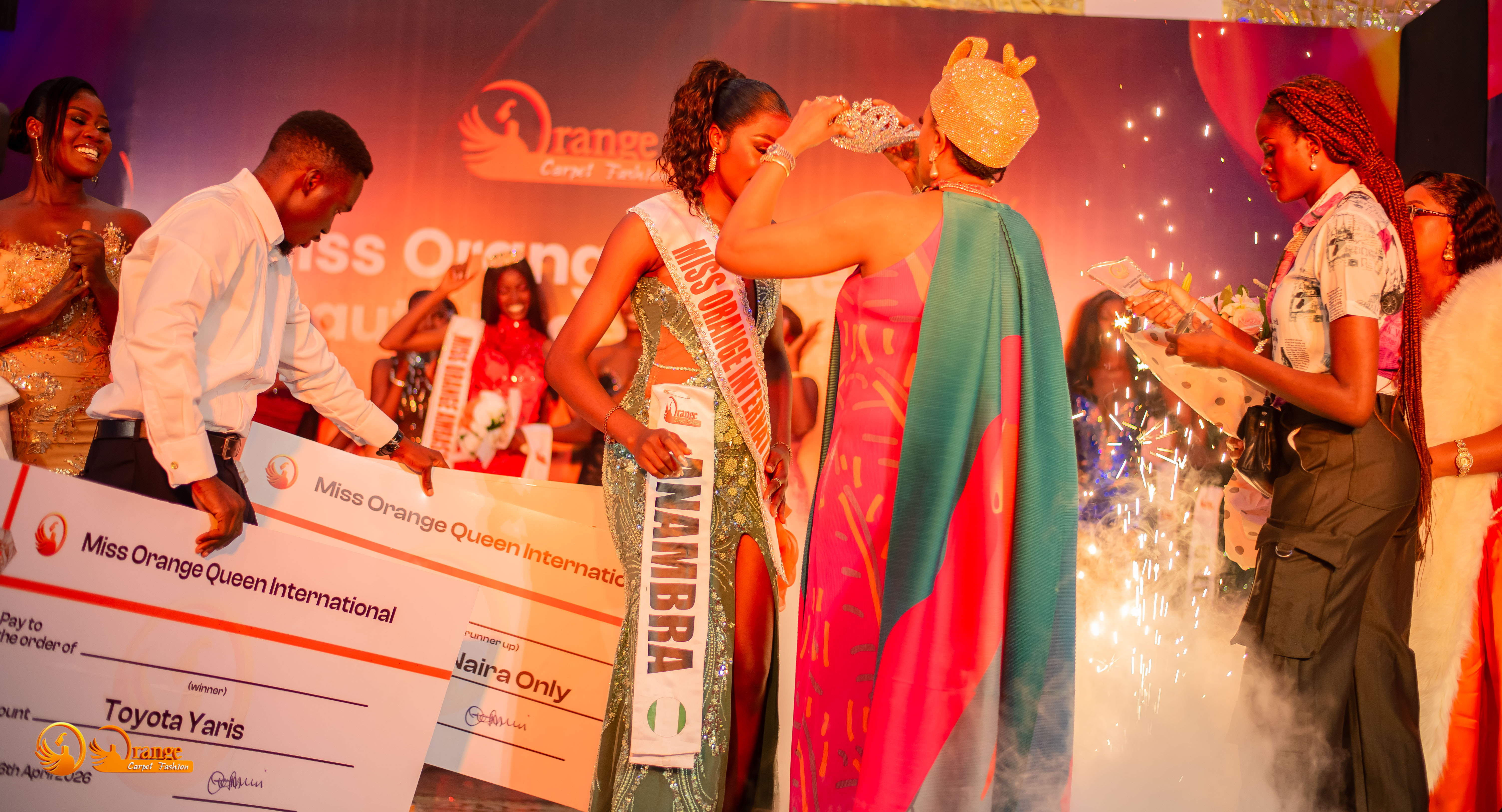 Nathanael Abigael Nwanneka being crowned with Toyota Yaris prize displayed on stage